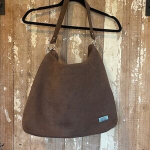 This is a Bella Russo hobo bag in a brown microfiber/suede-like material